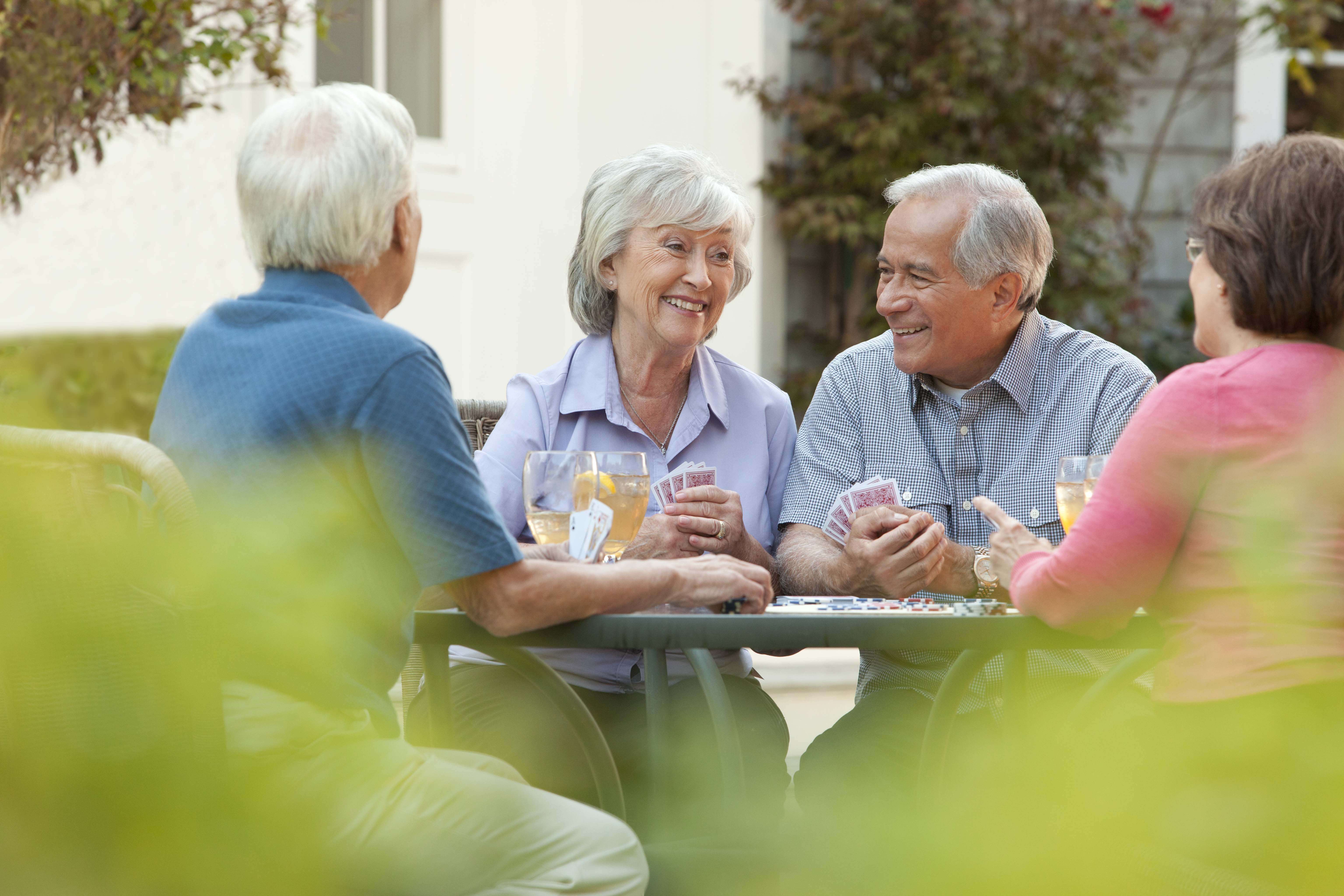 Four people sitting around a table