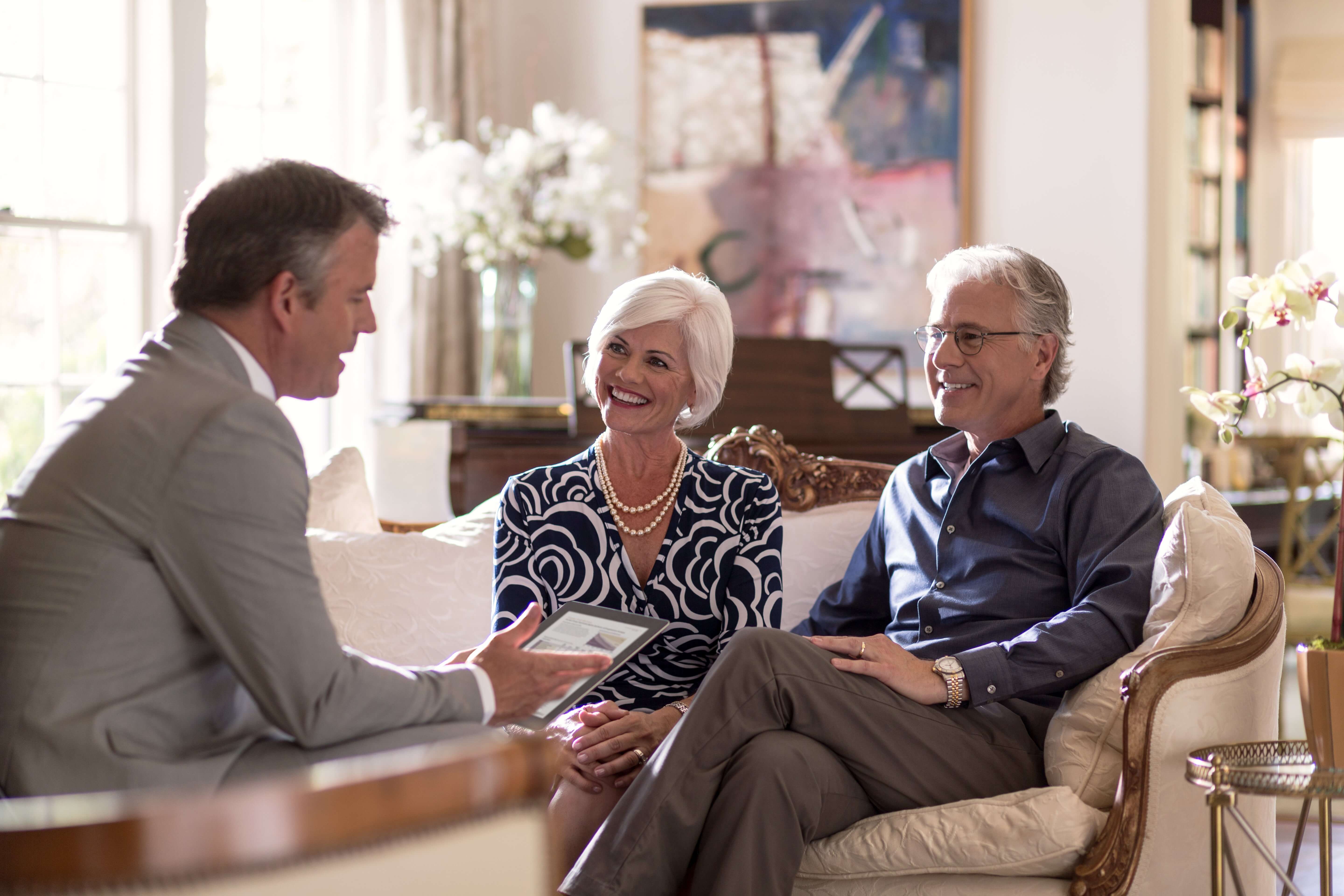 Three people at a meeting