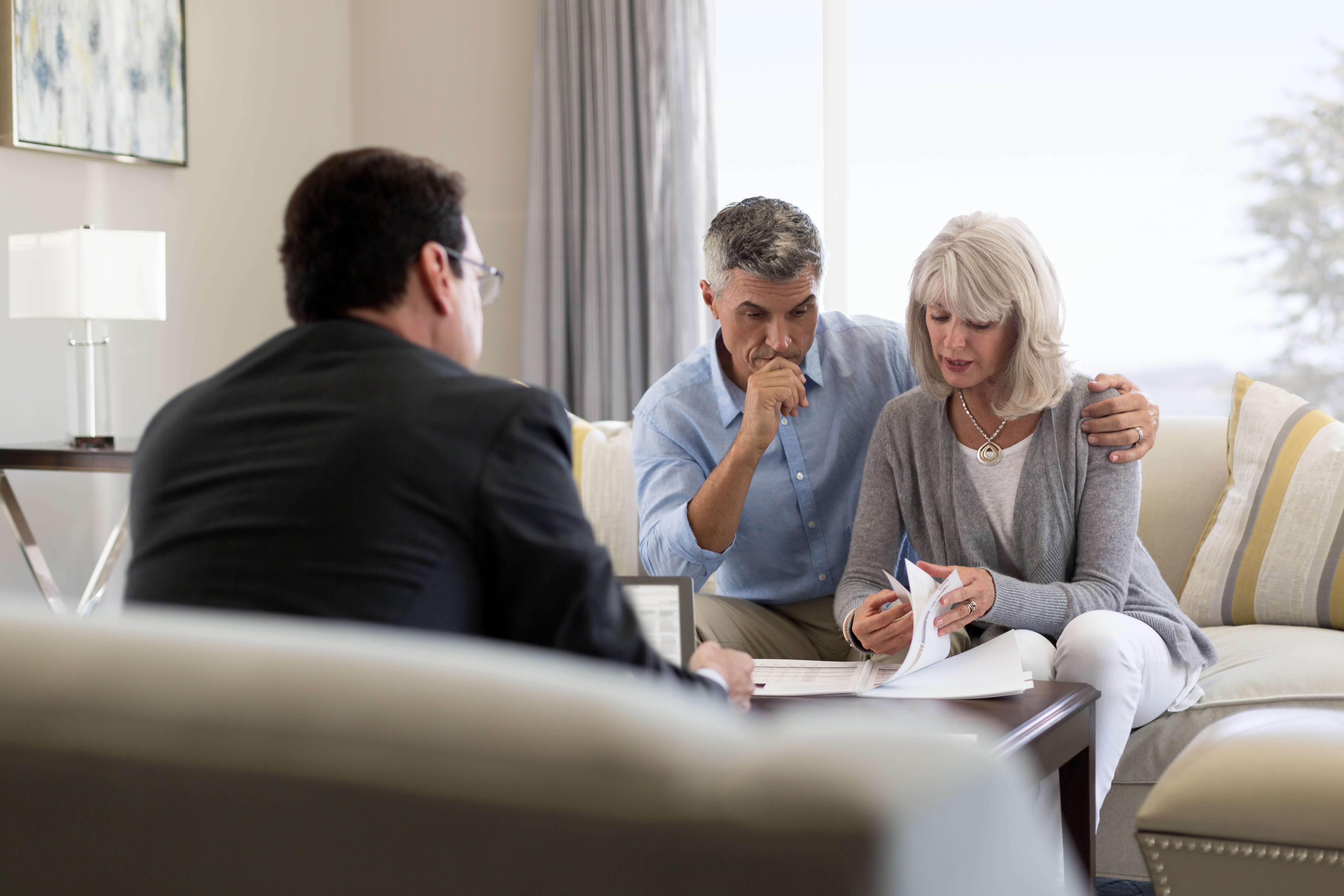 Three people at a meeting